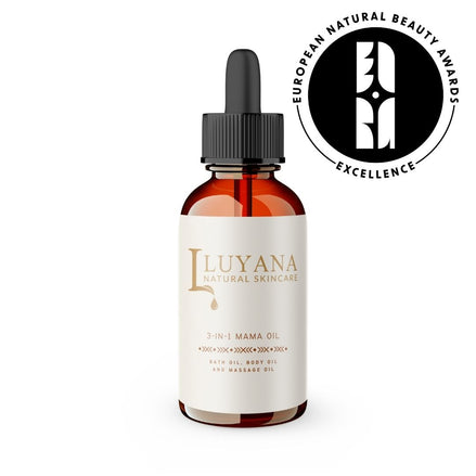 Luyana Natural Skincare 3-in-1 Mama Oil bottle with a dropper on a white background, featuring the European Natural Beauty Awards Excellence badge.